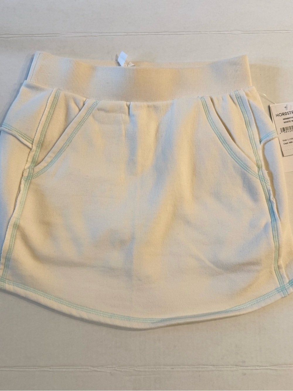 Zella Cream Mini Skirt with Contrast Stitching